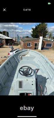 19ft Teal Fishing Boat, Twin Axle Trailer, 50hp Yamaha Outboard