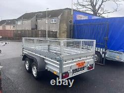 BRAND NEW 10ft x 5ft TWIN AXLE TRAILER WITH 40CM MESH 1300KG BRAKED