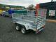 Brand New 7.7 X 4.2 Double Axle Trailer With 40cm Mesh And A Ramp