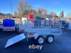 BRAND NEW 8,2ft x 4,3ft TWIN AXLE TRAILER WITH 60CM MESH AND RAMP 1300KG BRAKED