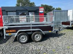 Brand New 8.2ft X4.4ft Twin Axle Trailer With Wooden Sides And 40cm Mesh 750kg