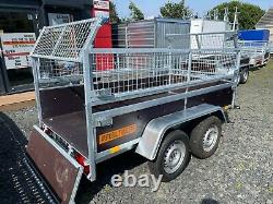 Brand New 8.2ft X4.4ft Twin Axle Trailer With Wooden Sides And 40cm Mesh 750kg