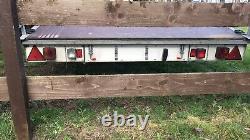 Car transporter trailer twin axle with spare wheel