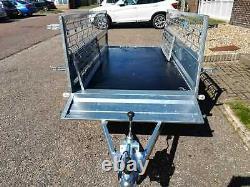 NEW CAR TRAILER BRAND NEW TWIN AXLE 8'7 x 4'1 750 kg CAGED SIDES