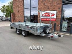 Nugent 12' x 6'7 twin axle flatbed complete with ladder rack and ally floor