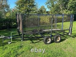 Trailer Twin Axle 10ft X 5.5 Ft Unbraked Mesh Sides And Ramp. Needs floor board