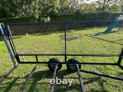 Trailer Twin Axle 10ft X 5.5 Ft Unbraked Mesh Sides And Ramp. Needs floor board