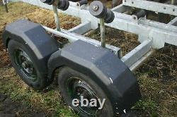 Twin axle boat trailer for small cruiser, motorboat. Yard or upgrade to road use