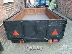Twin axle braked trailer can fit an 8ft x 4ft board inside