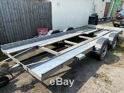 Twin axle car trailer with brake