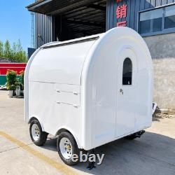 Remorque de restauration mobile compacte blanche à double essieu avec pod arrondi et doubles trappes de service