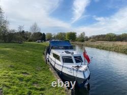 Viking 22 croiseur fluvial avec remorque Brenderup à double essieu