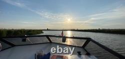 Viking 22 croiseur fluvial avec remorque Brenderup à double essieu